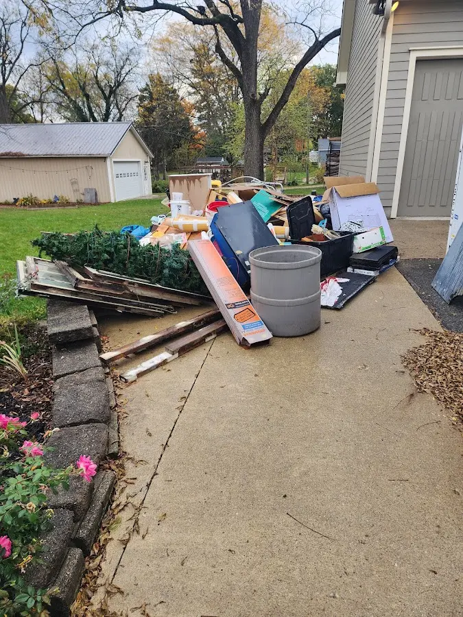 Dumpster being loaded with debris for Demolition Dumpster Rental in Marlborough